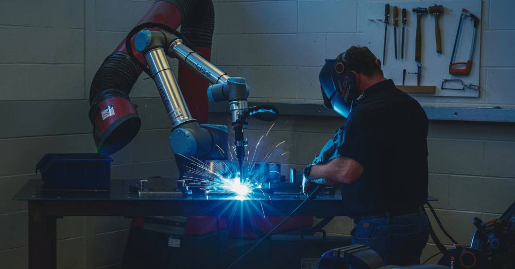 Cobot welding demonstration with instructor